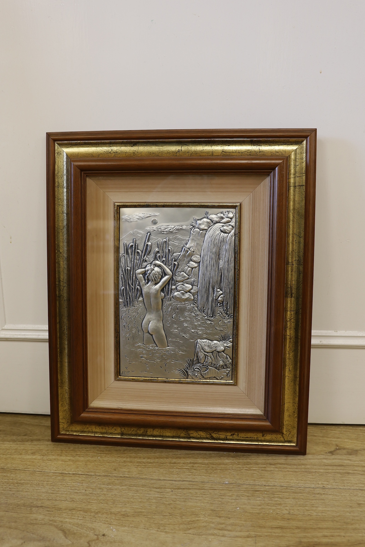 An Italian 925 framed silver plaque depicting a bathing nude lady, signed bottom left, certificate of authenticity to reverse, 27 x 18cm excl. frame. Condition - good